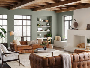 Living room space with muted green walls